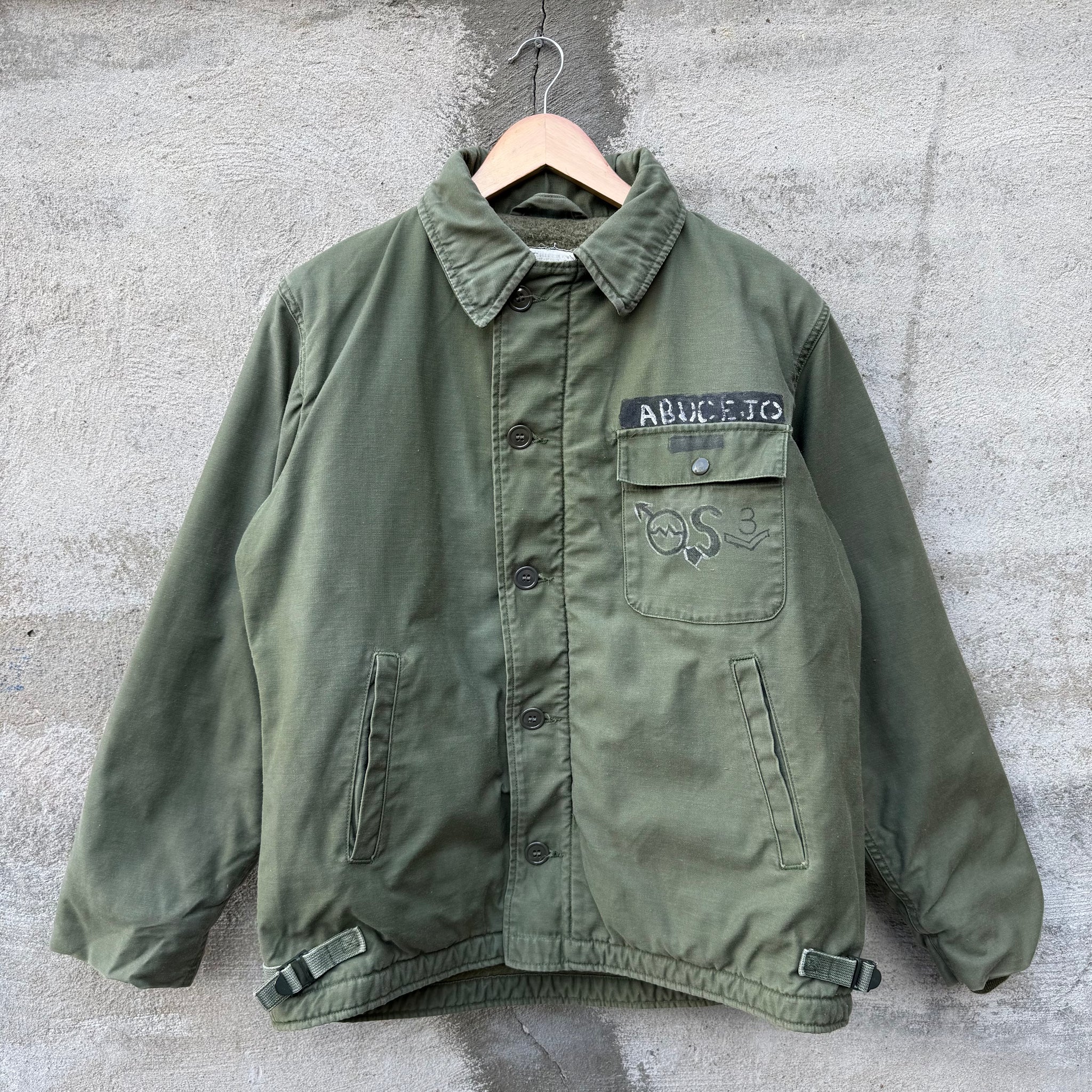 70's US Military Stenciled Olive Green A-2 Deck Jacket – Recycled 70's US Military Stenciled Olive Green A-2 Deck Jacket – Recycled